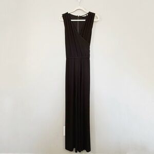 Chico’s Tie Waist Jumpsuit Wide Leg Size 3 Black Sleeveless V-neck Surplice US16